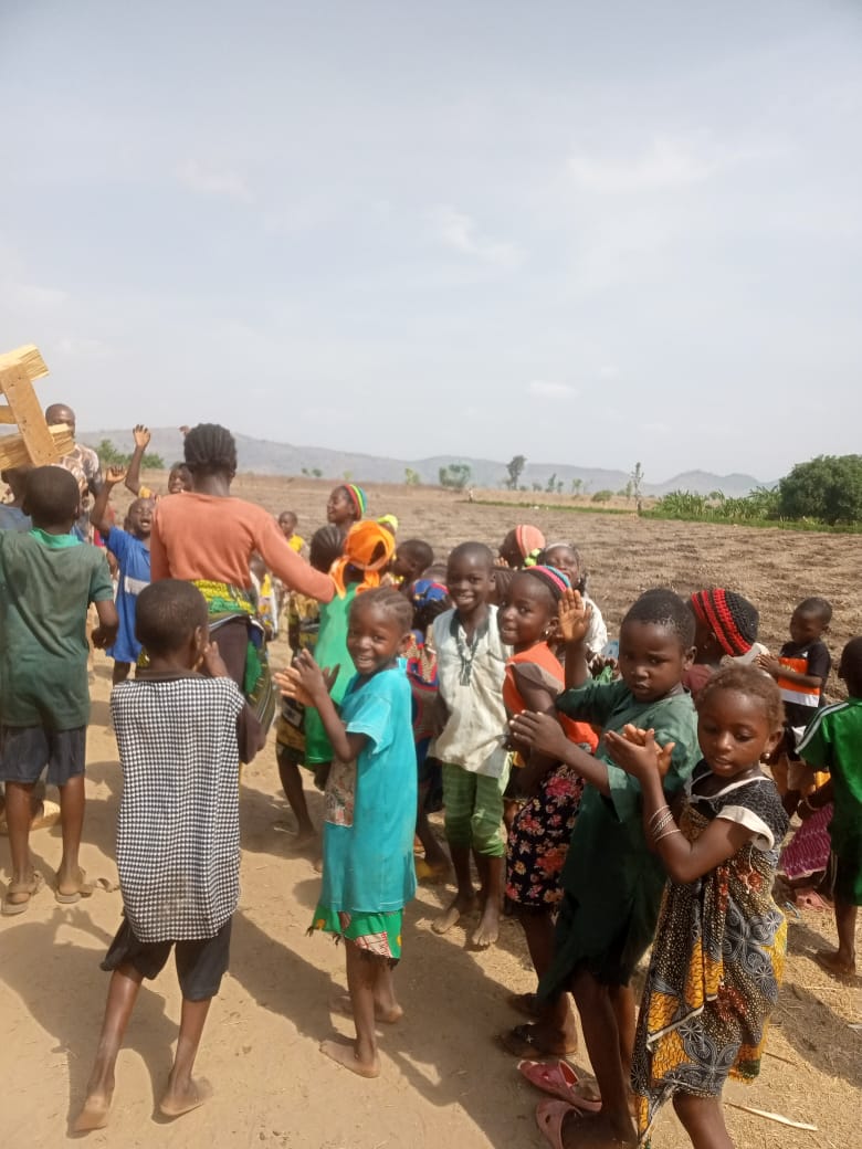 Children excited When the Great Evangelical Eternal Mission' supplied the school with chairs